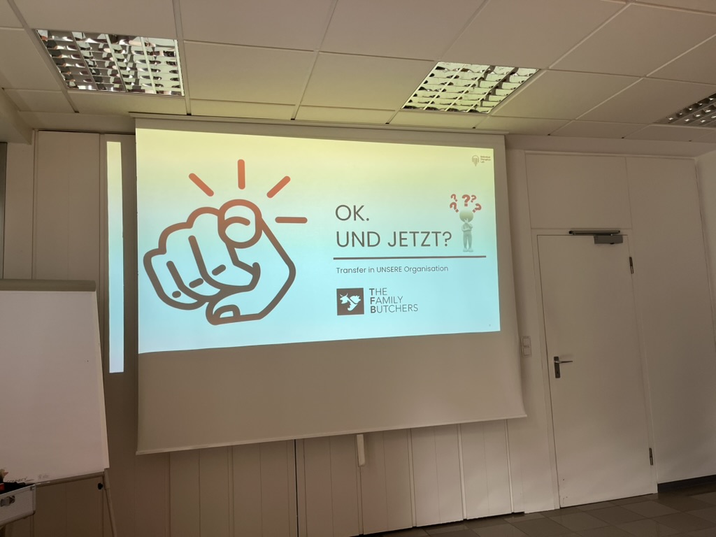 Präsentationsfolie „OK. Und jetzt?“ zum Transfer in die Organisation
